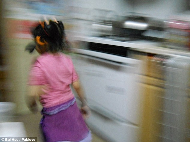In motion: Bai Hao, Age 13, New York, shot a young girl running in her kitchen