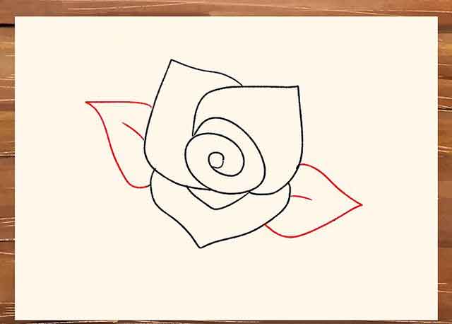 Как легко нарисовать розу - Нарисуйте по одному листику с каждой стороны цветка с небольшой жилкой по середине.
